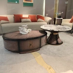 Designer Nesting Coffee Tables with Organic Curves and Layered Silhouettes